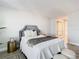 Cozy bedroom with a queen-size bed and tasteful decor at 400 Island Way # 1411, Clearwater Beach, FL 33767