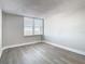 Bright bedroom with a window offering an outdoor view at 400 Island Way # 1411, Clearwater Beach, FL 33767