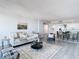 Open concept living room, dining, and kitchen area at 400 Island Way # 1411, Clearwater Beach, FL 33767