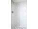 Clean shower with pebble floor and modern fixtures at 400 Island Way # 1411, Clearwater Beach, FL 33767