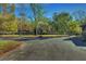 Basketball hoop and paved court in the backyard of a house at 5201 Pless Rd, Plant City, FL 33565