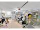 Converted garage with seating area, gym equipment and laundry at 5201 Pless Rd, Plant City, FL 33565