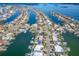 Aerial view of waterfront homes and community at 54 Midway Is, Clearwater Beach, FL 33767