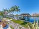 Private dock with boat lift and stunning water views at 54 Midway Is, Clearwater Beach, FL 33767