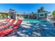 Inviting pool area with lounge chairs, perfect for relaxing at 54 Midway Is, Clearwater Beach, FL 33767