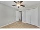 Spacious bedroom with double door closet and wood-look floors at 5508 Rainwood Meadows Dr, Apollo Beach, FL 33572