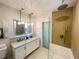 Elegant bathroom with double vanity and large shower at 5516 Golden Dr, Tampa, FL 33634