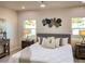Spacious primary bedroom with king-size bed and ample natural light at 5516 Golden Dr, Tampa, FL 33634