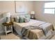 Comfortable bedroom with a queen-size bed and neutral decor at 5516 Golden Dr, Tampa, FL 33634