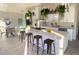 Open concept kitchen with white cabinets, a large island, and modern finishes at 5516 Golden Dr, Tampa, FL 33634
