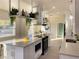 Open concept kitchen with large island and modern finishes at 5516 Golden Dr, Tampa, FL 33634