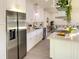 Modern kitchen with stainless steel appliances and white cabinets at 5516 Golden Dr, Tampa, FL 33634