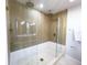 Large walk-in shower with glass enclosure and modern fixtures at 5516 Golden Dr, Tampa, FL 33634