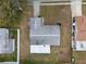 Aerial view of house, yard and neighborhood at 5601 Lima Dr, Holiday, FL 34690