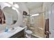 Bathroom with walk-in shower, tile flooring, and a vanity at 6337 Waves End Pl, Apollo Beach, FL 33572