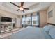 Main bedroom with a large bed and ample natural light at 6337 Waves End Pl, Apollo Beach, FL 33572