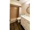 Bathroom with new vanity, hardwood floors, glass vessel sink, and tiled walk-in shower at 9107 Lingrove Rd, Weeki Wachee, FL 34613