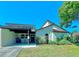 Charming single Gathering home with a covered carport and well maintained landscaping at 9107 Lingrove Rd, Weeki Wachee, FL 34613