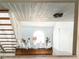 Open-concept living room with a staircase and bright, modern decor at 9107 Lingrove Rd, Weeki Wachee, FL 34613