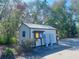 Community mail kiosk nestled among lush greenery and mature trees, providing convenient mail access at 9107 Lingrove Rd, Weeki Wachee, FL 34613