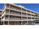 Three-story building with balconies and parking at 9950 62Nd N Ter # 316, St Petersburg, FL 33708