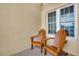 Small patio with two wooden chairs and a view at 100 4Th S Ave # 211, St Petersburg, FL 33701