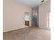 Spacious bedroom with neutral walls and carpeting, and an ensuite bathroom at 11240 Ragsdale Ct, New Port Richey, FL 34654