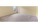 Simple bedroom with neutral walls and carpeted floor at 11240 Ragsdale Ct, New Port Richey, FL 34654