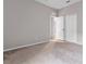 Bedroom with double door closet and carpeted floor at 11240 Ragsdale Ct, New Port Richey, FL 34654