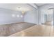 Spacious dining area with light gray walls and wood-look flooring at 11240 Ragsdale Ct, New Port Richey, FL 34654
