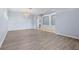 Dining room features light walls and wood-look flooring at 11240 Ragsdale Ct, New Port Richey, FL 34654