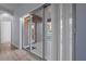 Sliding glass doors leading to a screened patio and backyard at 11240 Ragsdale Ct, New Port Richey, FL 34654