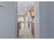 Kitchen with wood cabinets and white appliances at 11240 Ragsdale Ct, New Port Richey, FL 34654