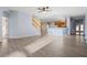 Sunlit living room with hardwood floors and a ceiling fan at 11240 Ragsdale Ct, New Port Richey, FL 34654