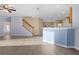 Living area with hardwood floors and a ceiling fan at 11240 Ragsdale Ct, New Port Richey, FL 34654