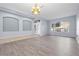 Spacious living room with hardwood floors and a neutral color palette at 11240 Ragsdale Ct, New Port Richey, FL 34654