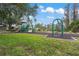 Community playground with playset and swings at 11240 Ragsdale Ct, New Port Richey, FL 34654