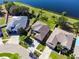 Aerial view of houses and a lake, showcasing the community at 11415 Laurel Brook Ct, Riverview, FL 33569