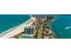 Aerial view of oceanfront property and coastline at 1390 Gulf Blvd # Ph-1, Clearwater Beach, FL 33767