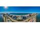 Panoramic aerial view of beach, high-rises, and coastline at 1390 Gulf Blvd # Ph-1, Clearwater Beach, FL 33767