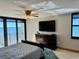 Bright bedroom with ocean view and large windows at 1390 Gulf Blvd # Ph-1, Clearwater Beach, FL 33767