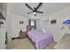 Cozy bedroom with a double bed and ceiling fan at 14135 Arbor Pines Dr, Riverview, FL 33579