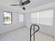 Bright Florida room with tile floor and multiple windows at 14140 E Parsley Dr, Madeira Beach, FL 33708