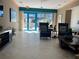Comfortable lounge with seating and access to outdoor patio at 1540 Gulf Blvd # 2107, Clearwater Beach, FL 33767