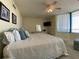 King-size bed in spacious main bedroom with water view at 1540 Gulf Blvd # 2107, Clearwater Beach, FL 33767