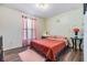 Charming bedroom with a full-size bed and decorative wall accents at 27025 Anthony Ave, Brooksville, FL 34602