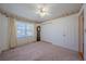 Spacious bedroom with neutral carpeting and double closets at 2921 Forestwood Dr, Seffner, FL 33584