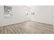 Spacious bedroom with wood-look flooring and large windows at 3005 E 17Th Ave, Tampa, FL 33605