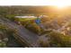 Aerial view of home on golf course with pool and nearby pond at 3401 Avenida Madera # B, Bradenton, FL 34210