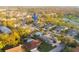 Aerial view of community with lush landscaping, golf course, and several community pools at 3401 Avenida Madera # B, Bradenton, FL 34210